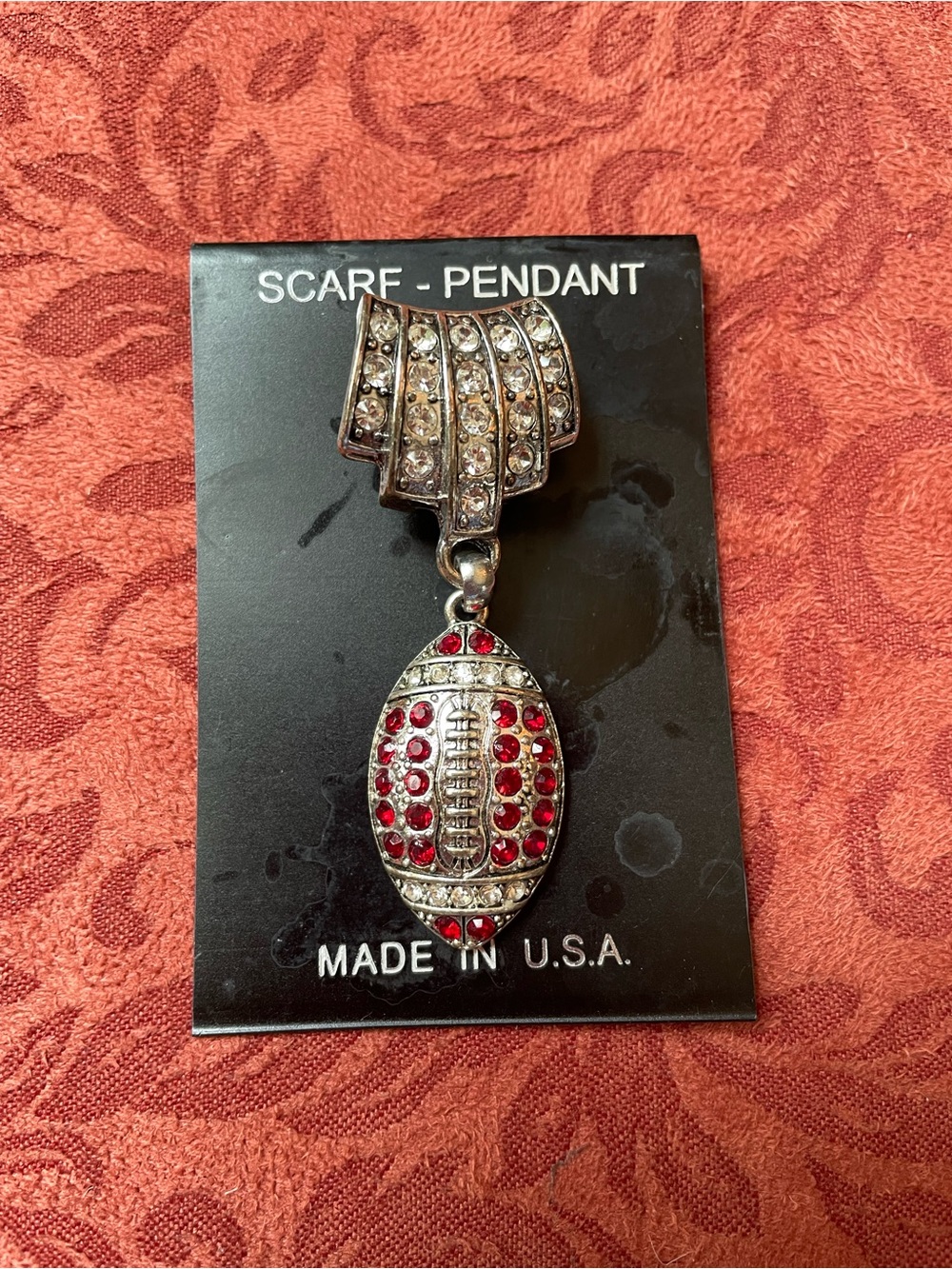 Scarf sports pendant